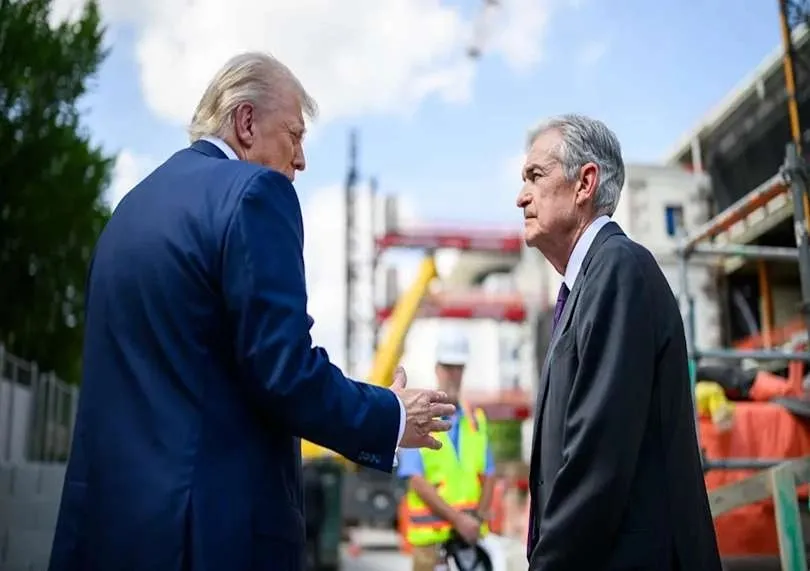 Jerome Powell and Donald Trump amid growing tensions over Federal Reserve independence and interest rate policy